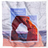 Crumpled map of Arches National Park with emblematic Delicate Arch, highlighting Utah's geological wonders and tourist attractions.
