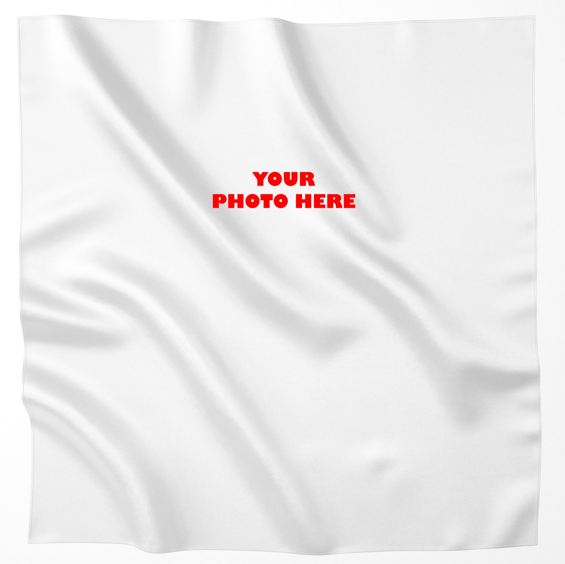 Customizable white banner mockup with a smooth, satiny texture and the prompt "Your Photo Here" in bold red text, ideal for personalized designs and advertising.